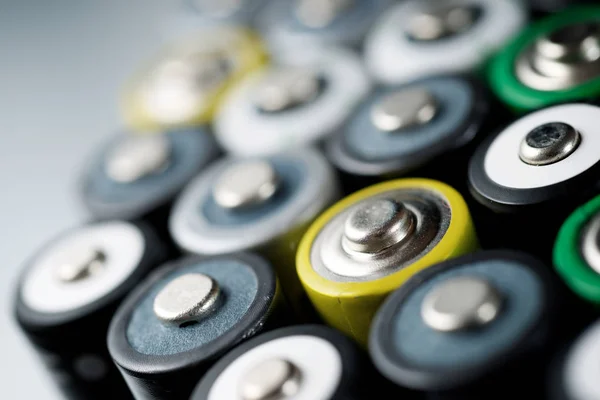 Many Batteries Metal Table — Stock Photo, Image
