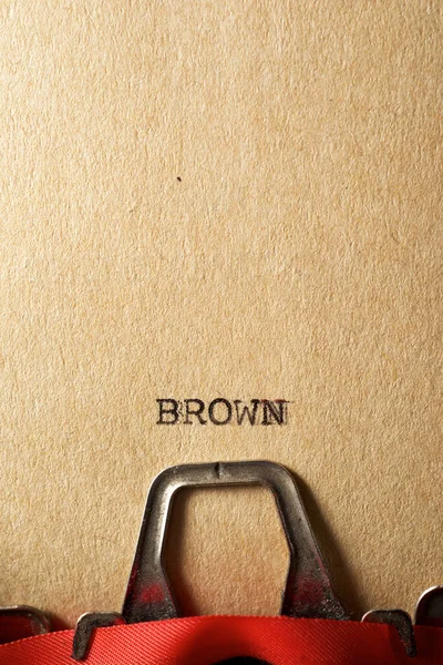 Brown word written on a paper.