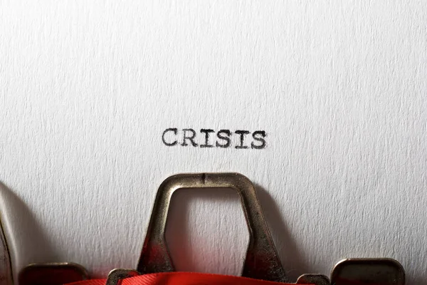 Palavra Crise Escrita Com Uma Máquina Escrever — Fotografia de Stock
