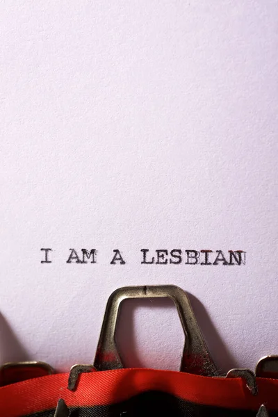 I am a lesbian text written on a paper.