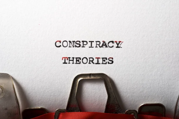 Conspiracy theories phrase written with a typewriter.