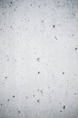 Boş bir beton duvarın görüntüsü.