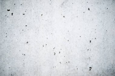 Boş bir beton duvarın görüntüsü.