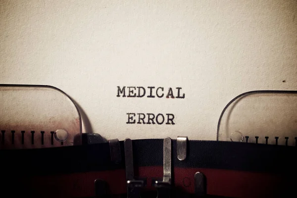 Medical error phrase written with a typewriter.