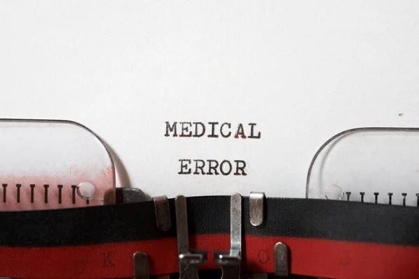 Medical error phrase written with a typewriter.