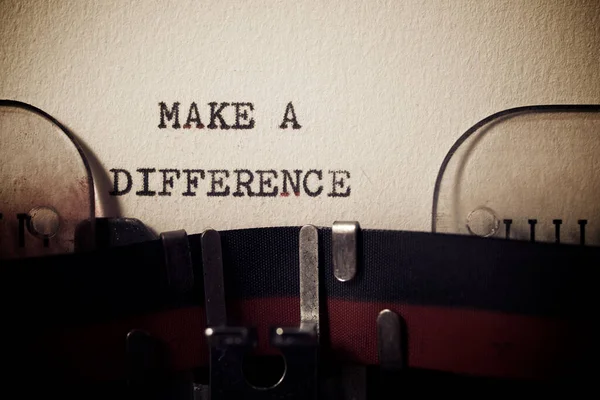 Make a difference phrase written with a typewriter.