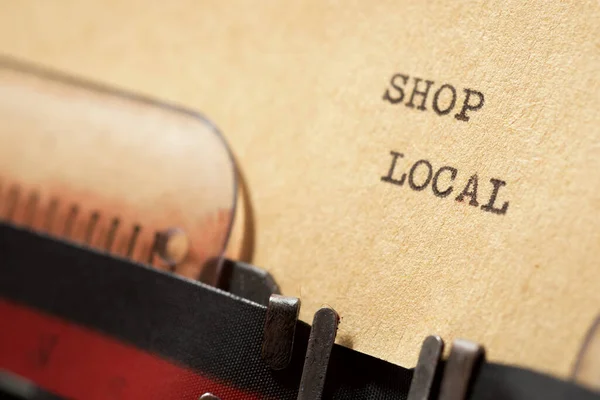 Shop local phrase written with a typewriter.