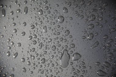 yağmur damla gri cam arka plan doku doğa üzerinde Kapat