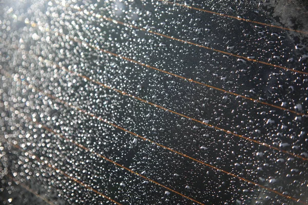 Närbild Regndroppar Grå Glas Bakgrund Natur Textur — Stockfoto