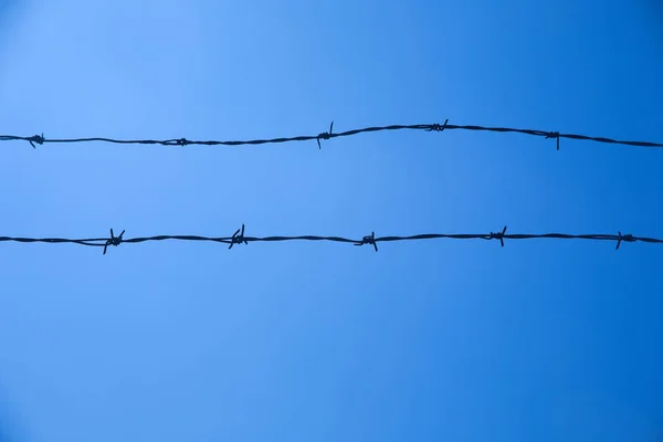 steel fence and sky