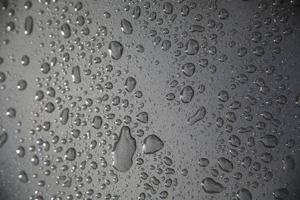 raindrops on dark window
