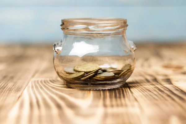 Coins Transparent Jar Wooden Background Shallow Depth Field — Stock Photo, Image