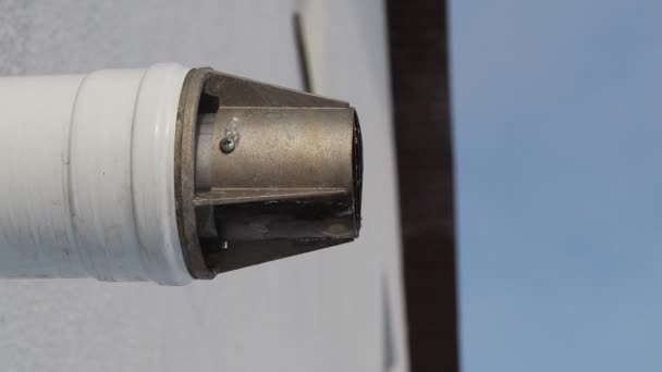 Pipe from the gas boiler. removal was carried out on the street. froze Icicles weigh on it. accident, repair. — Stock Footage Pipe Gas Boiler Removal Carried Out Street Froze Icicles Weigh Stock Footage