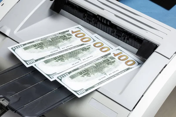 printed dollars. home printer. concept crime fake money