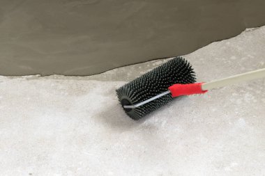 beton zemin. şafak sökmek üzereydi. yakın çekim. Hava kabarcıkları kaldırmak için iğne silindir. tonlama var. o zaman resim olacaktır.