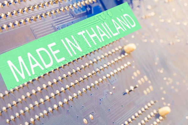 Motherboard. on it close up inscription made in Thailand — Stock Photo, Image