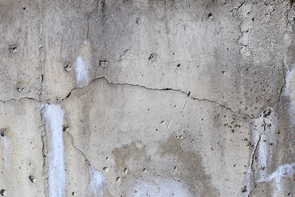 Muro de hormigón. hay una grieta en él. textura. tecnología de construcción violada . —  Fotos de Stock