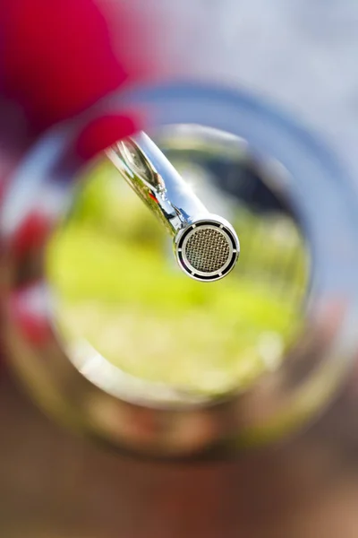 Sink installation concept. Bottom view of the iron shell and gander. — Stock Photo, Image