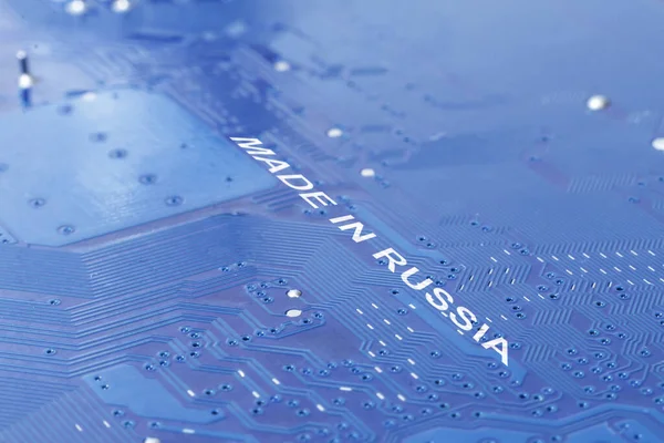 Close-up. motherboard in blue. the inscription is made in Russia. — Stock Photo, Image