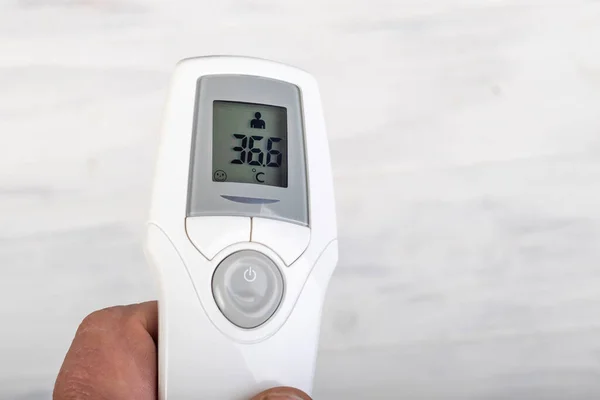 medical concept. electronic thermometer for measuring temperature. Reading 36.6. close-up