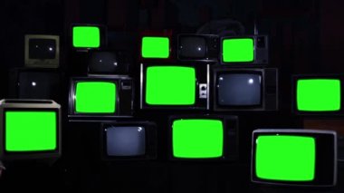 Birçok TV ile yeşil perde. Mavi koyu tonu. 80 lerin estetik. Yeşil ekranlı yerine herhangi bir film için hazır ya da istediğiniz resim. Full Hd.