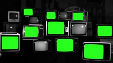 Birçok TV ile yeşil perde. Siyah ve beyaz sesi. 80 lerin estetik. Yeşil ekranlı yerine herhangi bir film için hazır ya da istediğiniz resim. Full Hd.
