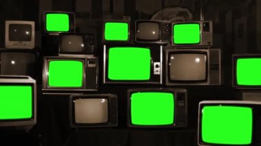 Birçok TV ile yeşil perde. Sepya sesi. 80 lerin estetik. Yeşil ekranlı yerine herhangi bir film için hazır ya da istediğiniz resim. Full Hd.