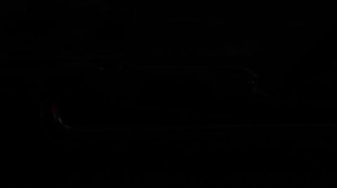 Neon ampul ışık Iluminated bir masa üzerine olmak. Full Hd. 