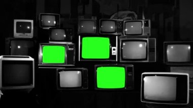 Birçok TV ile yeşil perde. Siyah ve beyaz sesi. 80 lerin estetik. Yeşil ekranlı yerine herhangi bir film için hazır ya da istediğiniz resim. Full Hd.