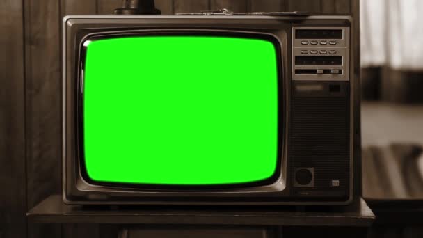 Vintage Tv zöld képernyő. A 80-as években az esztétika. Szépia tónusú. Kicsinyítés. Kész arra, hogy cserélje ki a zöld képernyő felvétel vagy képet szeretne. Full Hd.