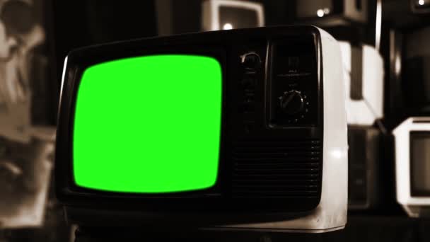 Régi Tv zöld képernyő-val sok TV-vel felszerelt szépia hangot. 