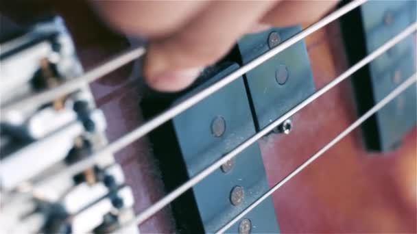 Bass Guitar Fingers Strings Macro Shot — Stock Video