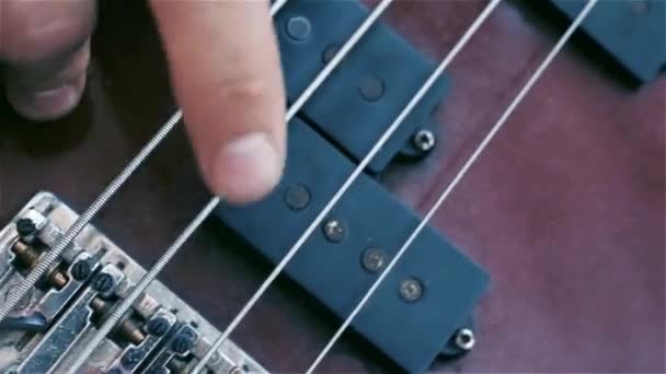 Bass Guitar Fingers Strings Macro Shot — Stock Video