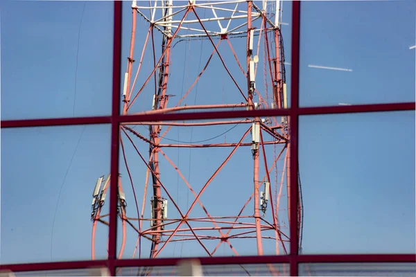 Reflection of radio transmission tower with cellular communicati
