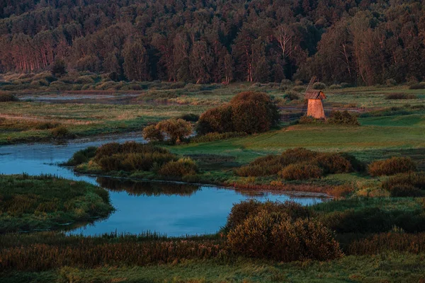 Old windmill in Mikhailovskoe, a family estate of the famous Russian poet Alexander Pushkin. — Stock Photo, Image