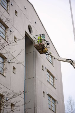 Onarım ve bina kullanarak geri yükleme cephe lifter vinç