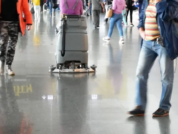 Airline passengers in airport, people and traveling luggage walking in airport terminal