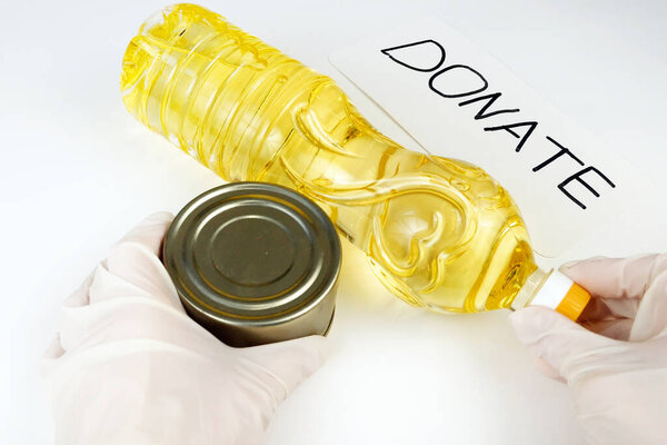 Donation food concept, products, free food concept, fruits, oil in bottle and canned food on white background, food drive 