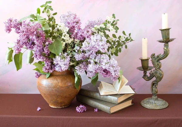 World Teacher's day concept. Flowers bunch, map, globe and books pile