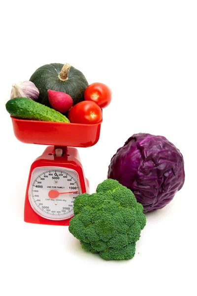 Vegetables and kitchen scales isolated on white background — Stock Photo, Image