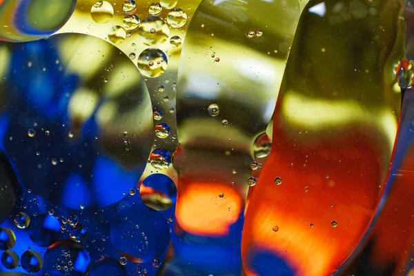 Fundo colorido de gotas de água e óleo — Fotografia de Stock