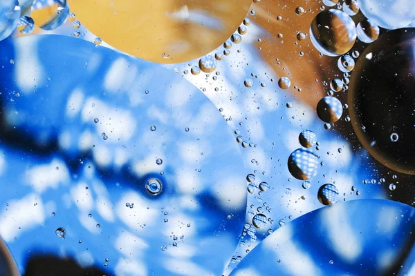 Fundo colorido de gotas de água e óleo — Fotografia de Stock