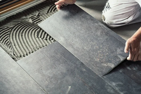 Worker Placing Ceramic Floor Tiles Adhesive Surface — Stock Photo, Image