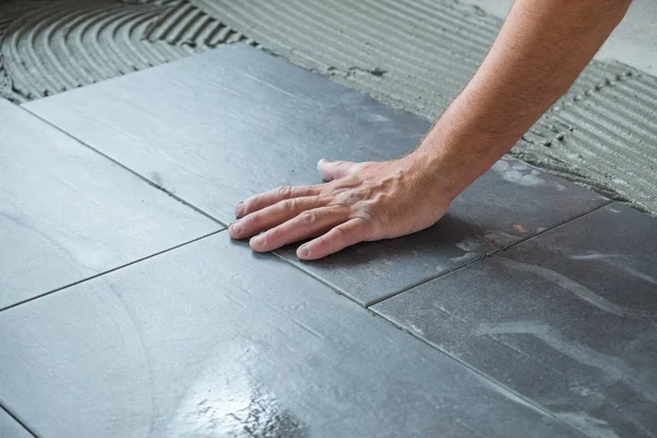 Worker Placing Ceramic Floor Tiles Adhesive Surface — Stock Photo, Image