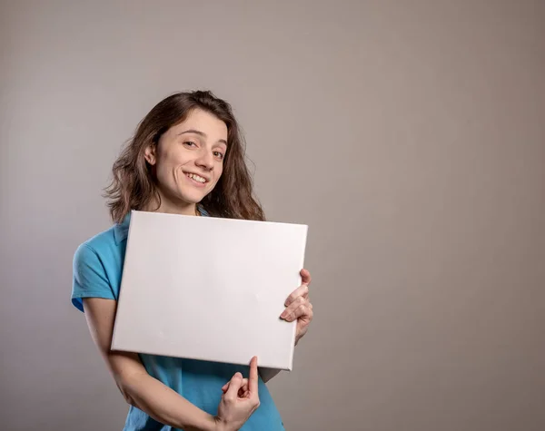 Woman Blue Shirt Gesturing Blank Sign Spokeswoman Holding Sign Room — Stock Photo, Image