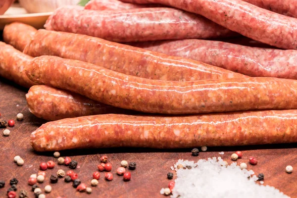 Raw Sausages Chilli Herbs Wooden Board Spices — Stock Photo, Image