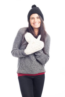 yün şapka bir kazak ve eldiven SMI ile oldukça esmer kadın