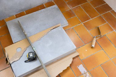 ceramic tile installation site with its tools clipart
