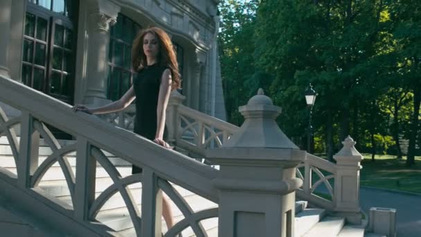 Gothic woman on stairs — Stock Video