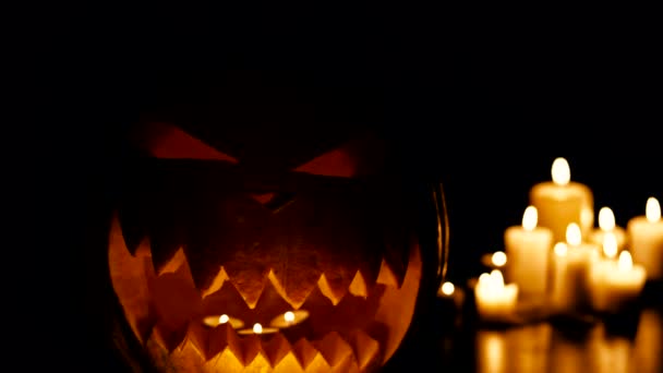 Helloween pumpkin with candles — Stock Video